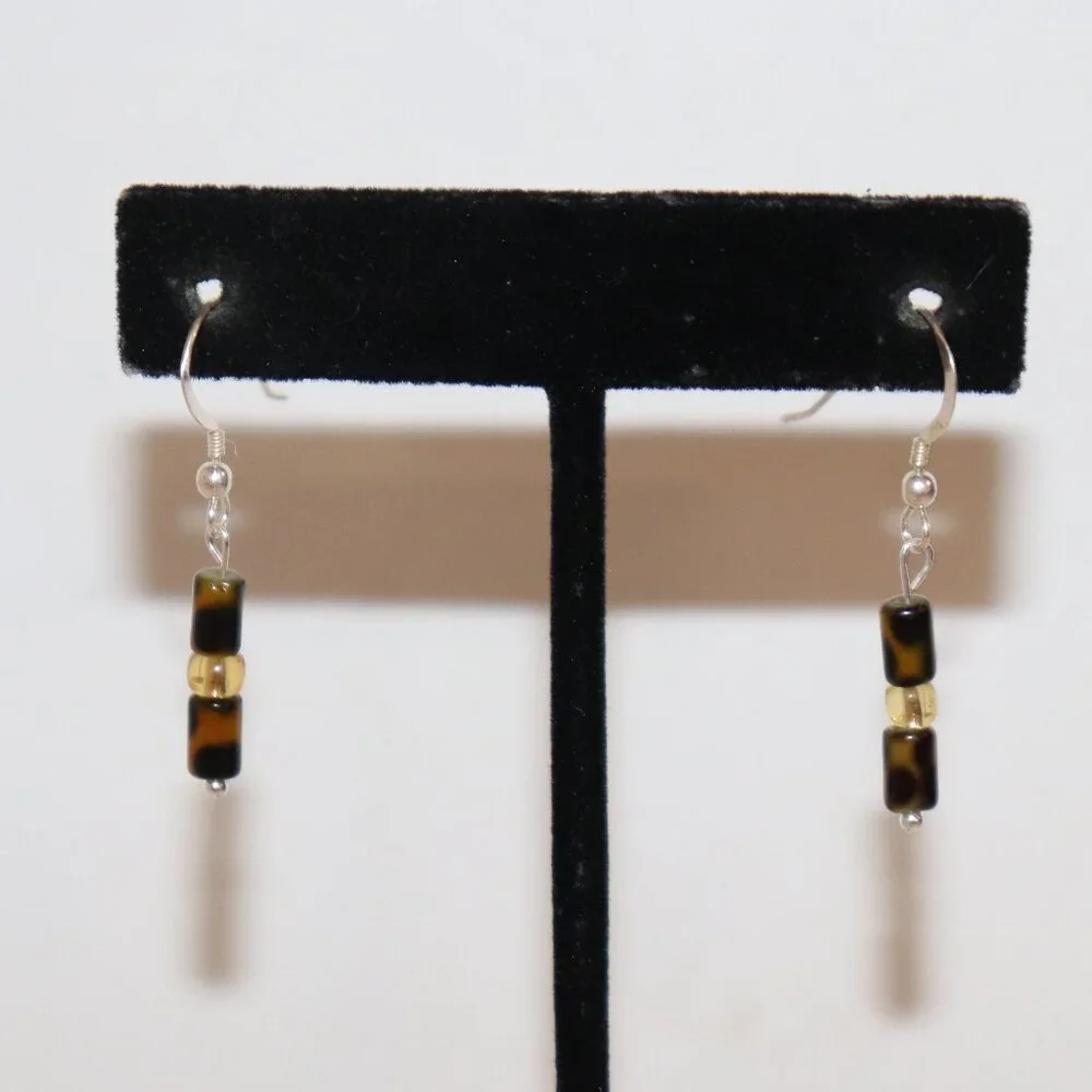 Beautiful NWOT Silver, animal print and yellow dangle earrings 1.5